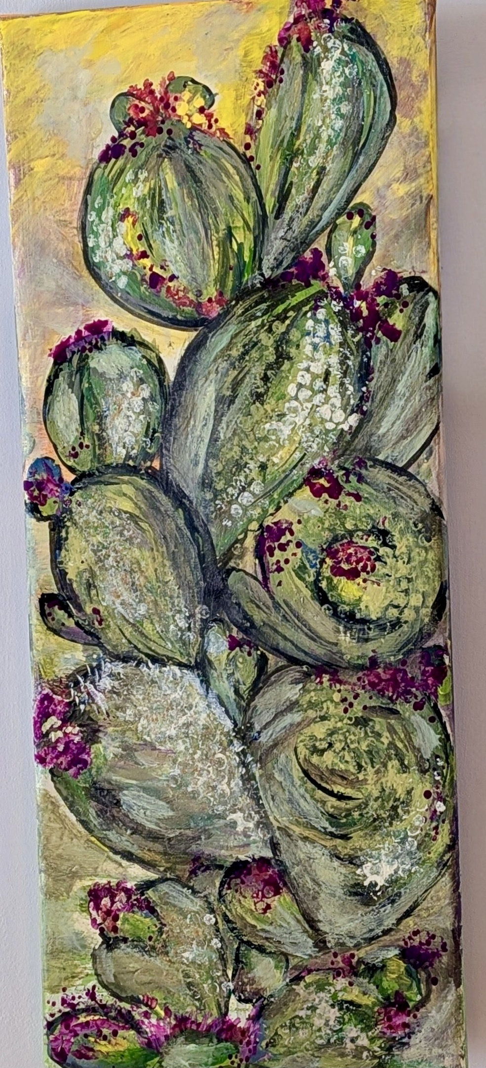 Toile de l’artiste Anne Lupien teintés de verts et jaunes des cactus en mouvement 